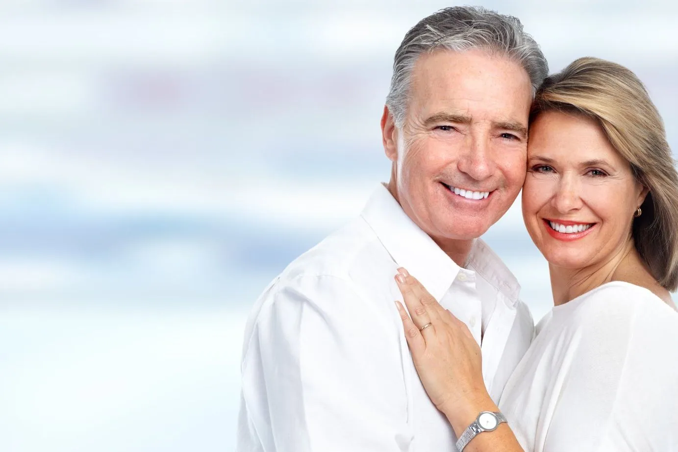 Smiling mature couple embracing